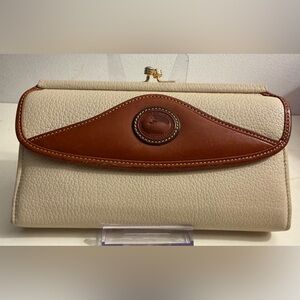 Dooney and Bourke all weather leather wallet with kiss - lock